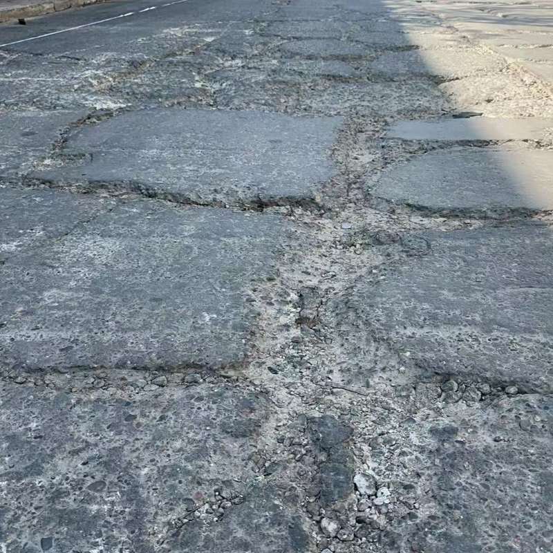 彭山路面起砂露石子修补料